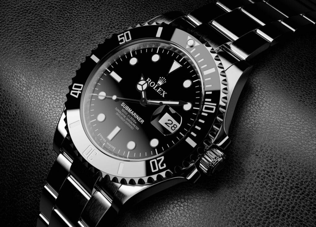 Close-up shot of a black Rolex Submariner Date with a ceramic bezel and stainless steel Oyster bracelet on black leather.